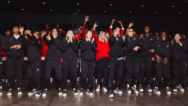 The Lady Raiders celebrating after their name was called in the Selection Show.
