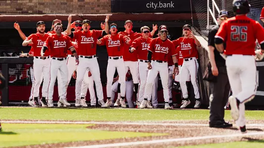The Red Raider dugout erupts following Matt Quintanar's First Home Run as a Red Raider