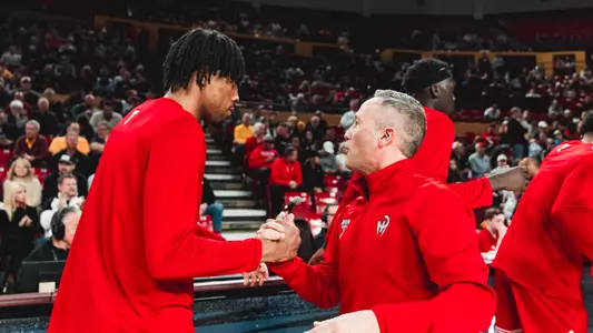 JT Toppin and Grant McCasland greet each other before playing a game at Arizona State.