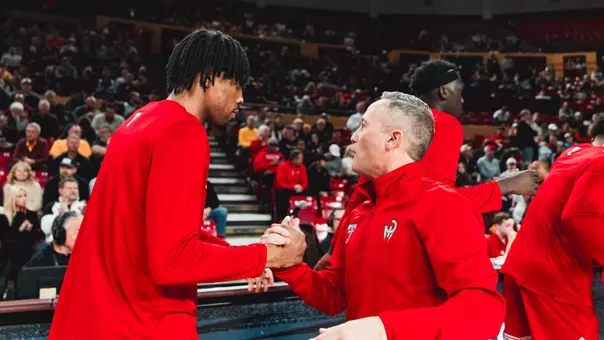 JT Toppin and Grant McCasland greet each other before playing a game at Arizona State.