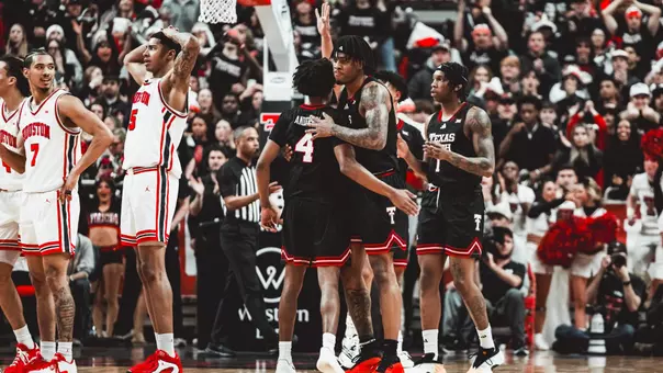 Christian Anderson and JT Toppin come together after a big play in a win over Houston.