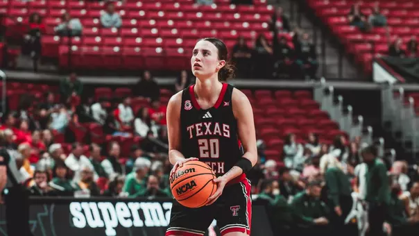 Bailey Maupin preparing to shoot a free throw.