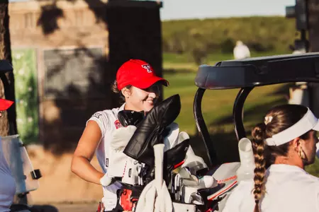 Cameron Freund prepares to tee off for a round at the Rawls Course