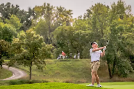 Brady McHenry hits an iron shot