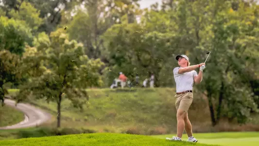 Brady McHenry hits an iron shot