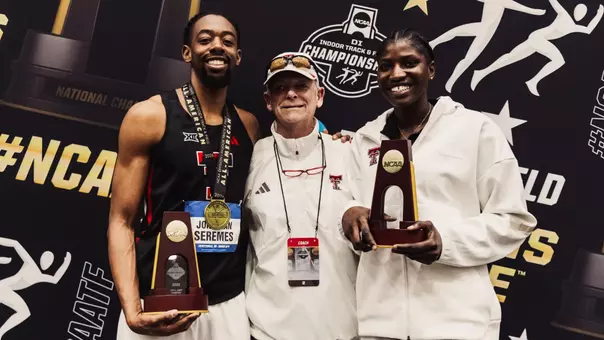 Wes Kittley takes a photo with national champions Jonathan Seremes (left) and Temitope Adehsina (right)