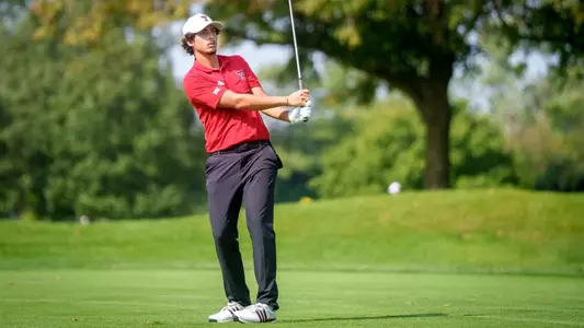Adam Bresnu dials in an approach shot