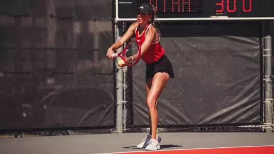 Ella Brownback preparing to serve.