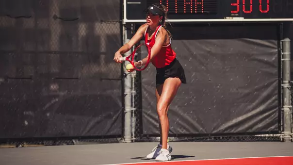 Ella Brownback preparing to serve.