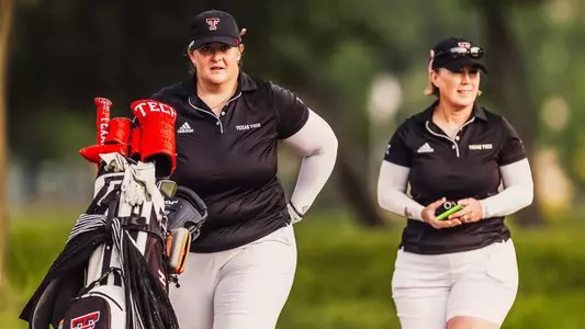 Lauren Zaretsky walking the course with head coach JoJo Roberson