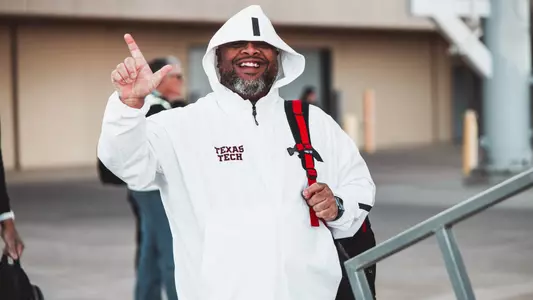Kellen Buffington poises with his Guns Up prior to the Red Raiders taking off for Tampa and the NCAA Tournament.