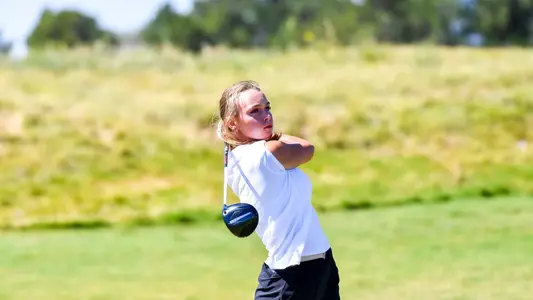 Denisa Vodickova hits a iron shot