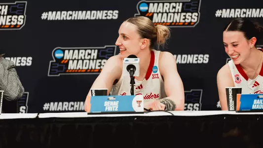 Denae Fritz smiling during the press conference.