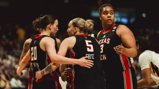 Denae Fritz looks at Bailey Maupin in the Lady Raider huddle during Texas Tech's NCAA Tournament loss at LSU.