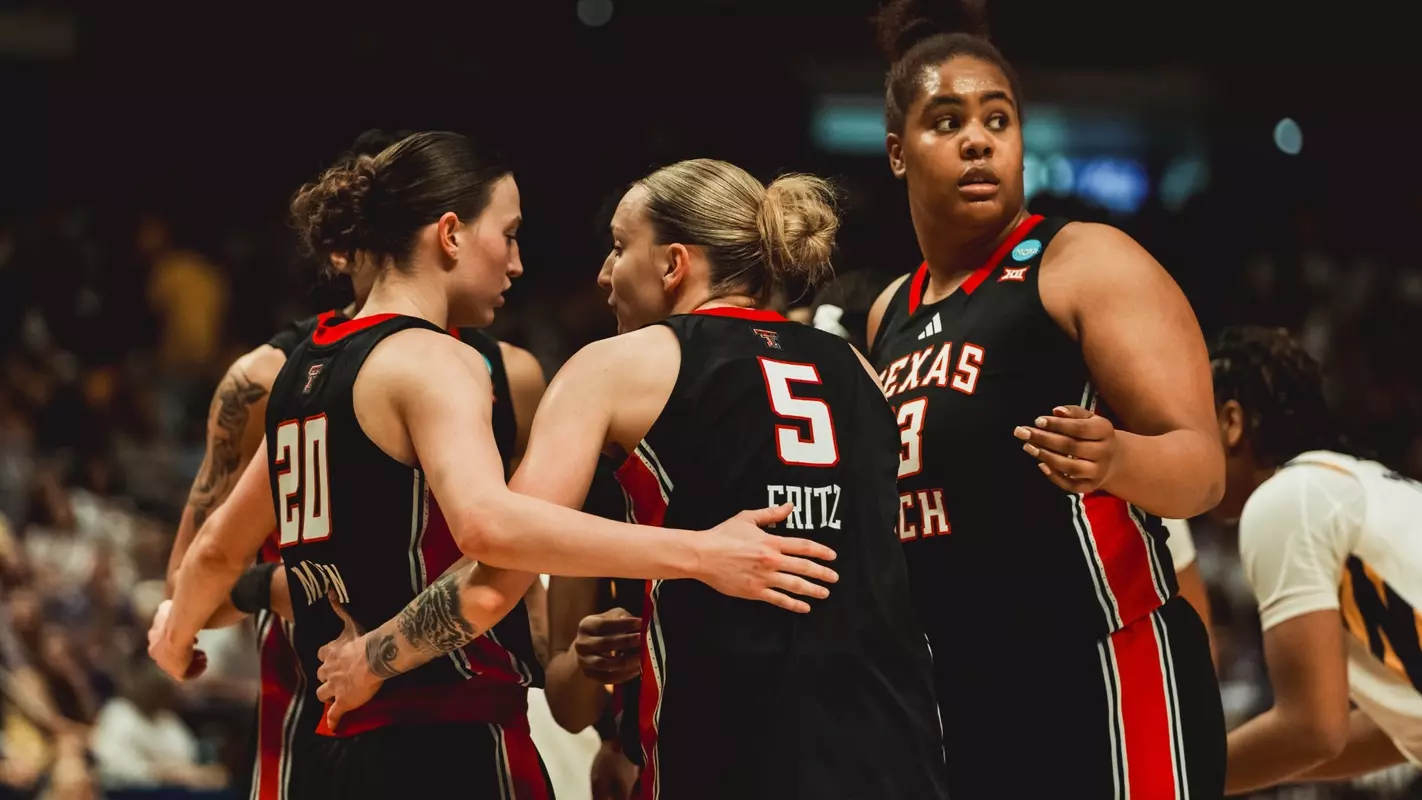 Denae Fritz looks at Bailey Maupin in the Lady Raider huddle during Texas Tech's NCAA Tournament loss at LSU.
