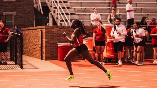 Vanessa Balde sprinting to the finish in the 400m hurdles race