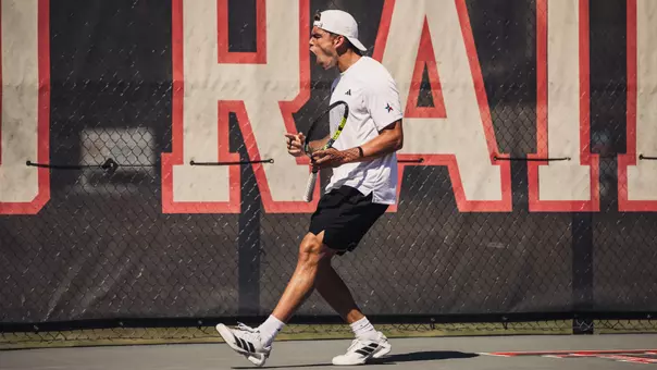 Ludovico Vaccari yelling after winning his match. Texas Tech vs Oklahoma State Men's Tennis on March 21, 2026. (Photo by Joseph Cabrera/ Texas Tech Athletics)