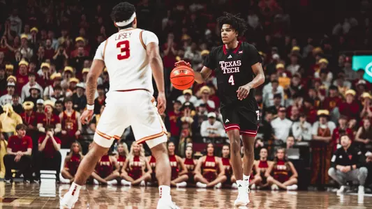Christian Anderson brings the ball up the court in a win over Iowa State.