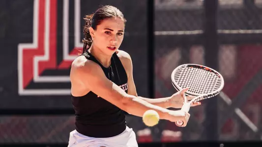 Havana Kadi hitting a slice. Texas Tech vs Colorado women's tennis on March 28, 2026 in Lubbock, TX. (Photo by Gavin Daly/Texas Tech Athletics)