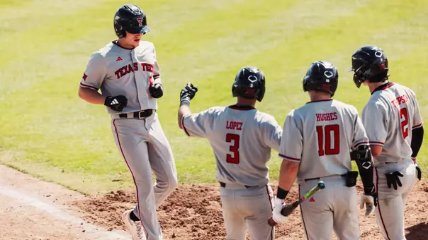 Texas Tech Infielder Connor Shouse touches home after a 7th inning home run against the University of Arizona