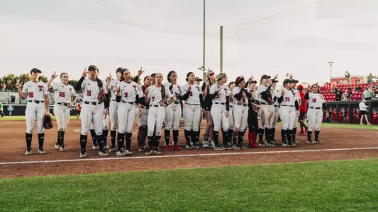 Texas Tech softball team doing the school song following a game against detroit mercy