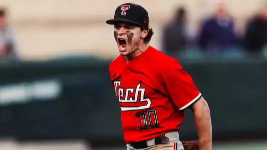 Jesse Rusinek Screams in excitement coming off the mound against TCU