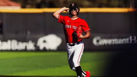 Texas Tech Freshman Infielder Linkin Garcia fields a ball at shortstop and begins his throwing motion in the Red Raiders Saturday contest against CSU Bakersfield.