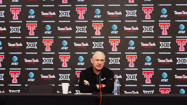 Joey McGuire sits behind the press conference table to address the local media ahead of 2026 spring practices.