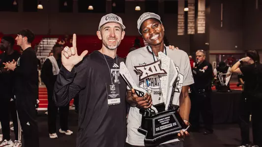 Keith Herston and Temitope Adeshina posing for a photo