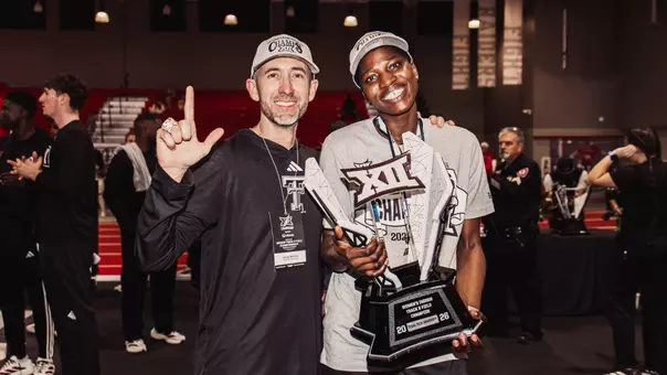 Keith Herston and Temitope Adeshina posing for a photo