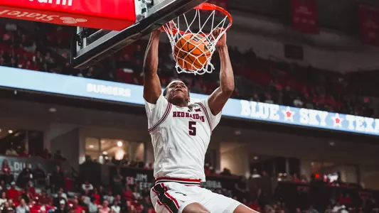 Josiah Moseley throws down a dunk in a win over Cincinnati.