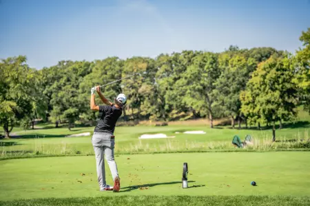 Adam Bresnu hits a tee shot in Illinois