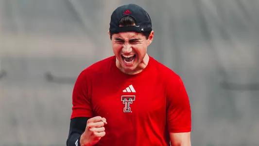 Sebastian Abboud yells after winning his match. Texas Tech MTEN vs UL February 13, 2026 in Lubbock, TX. (Photo by Michael Maddox/Texas Tech Athletics