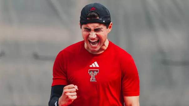 Sebastian Abboud yells after winning his match. Texas Tech MTEN vs UL February 13, 2026 in Lubbock, TX. (Photo by Michael Maddox/Texas Tech Athletics