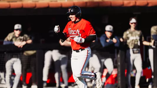 Texas Tech OF Logan Hughes Celebrates his sixth inning home run Saturday in the Red Raiders 21-6 win over Penn State