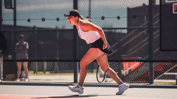 Polina Sleptsova yelling after winning her doubles match.