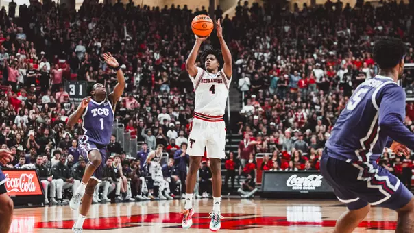 Christian Anderson shoots a 3-pointer against TCU in Tech's home finale.