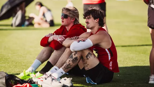 Sean Gribble (left) and Sam Hurley (right) taking a break in the shade