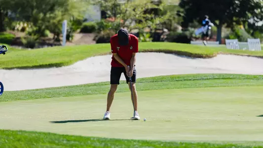 Connor Graham setting up a putt during the Pauma Valley Invitational