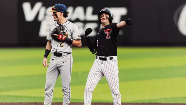 Tracer Lopez celebrates a double during the Red Raiders Friday night contest with No. 17 WVU