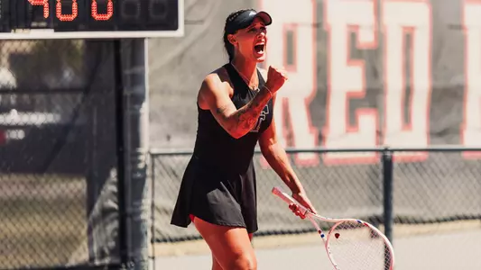 Yekaterina Dmitrichenko yells after winning a point. Texas Tech University vs Texas Christian University Women’s Tennis on April 9, 2026 in Lubbock, TX. (Photo by Morgan Pickett/Texas Tech Athletics)