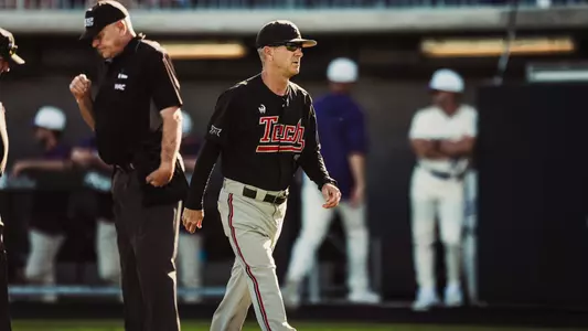 Tim Tadlock walks back to the third base dugout in last year's contest at ACU
