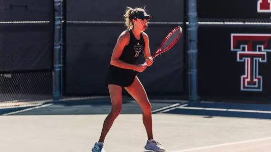 Ella Brownback waiting for a serve. Texas Tech University vs Texas Christian University Women’s Tennis on April 9, 2026 in Lubbock, TX. (Photo by Morgan Pickett/Texas Tech Athletics)