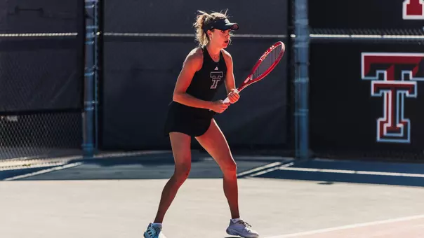 Ella Brownback waiting for a serve. Texas Tech University vs Texas Christian University Women’s Tennis on April 9, 2026 in Lubbock, TX. (Photo by Morgan Pickett/Texas Tech Athletics)