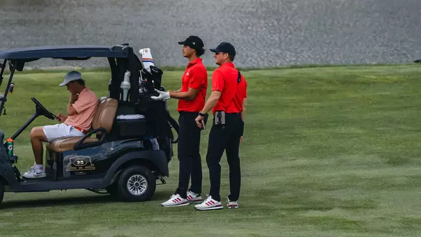 Adam Bresnu and Greg Sands deliberate the next shot during the Mountaineer Invitational