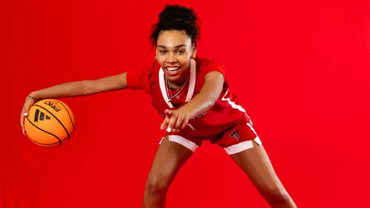 Tahys Da Silva dribbling a ball during a photoshoot.