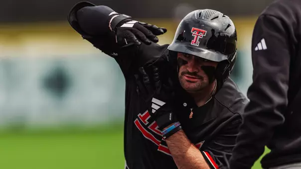 Tracer Lopez celebrates his first inning single that tied him with Scott LeJeune