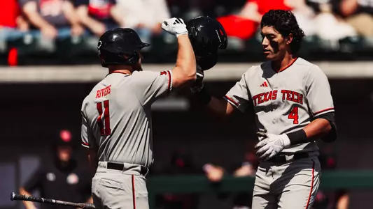 Linin Garcia and Davis Rivers celebrate Garcia's fourth inning home run Sunday afternoon at Utah