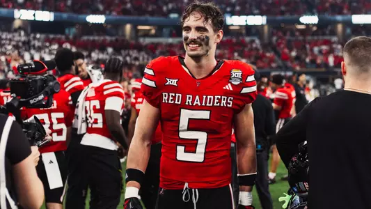 Cole Wisniewski smiles as Texas Tech celebrates its win over BYU in the Big 12 Championship.
