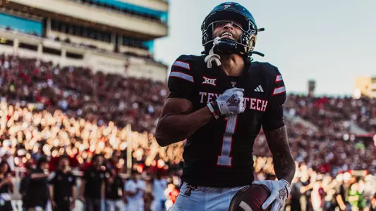 Reggie Virgil celebrates after celebrating a touchdown in Texas Tech's win over UCF.